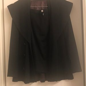 Two-piece black fly away jacket and skirt set